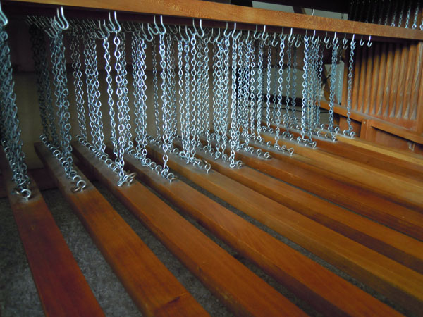 The treadles (on my Kyra loom) attached to the lams via chains.