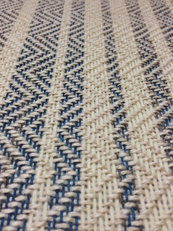 A detail of the weaving on the loom.