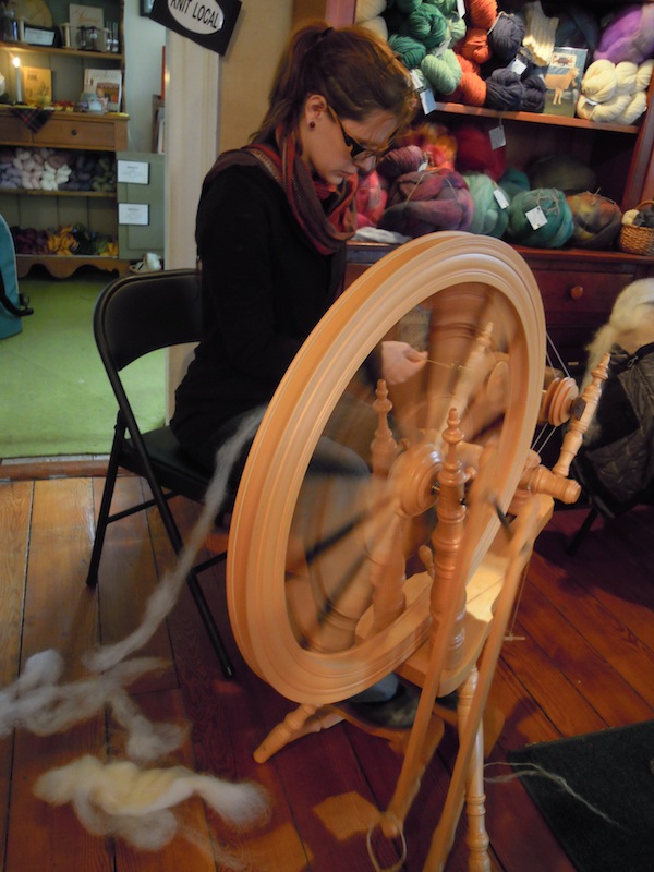 Taking a short class on how to spin on a wheel that is much fancier then what I actually have.