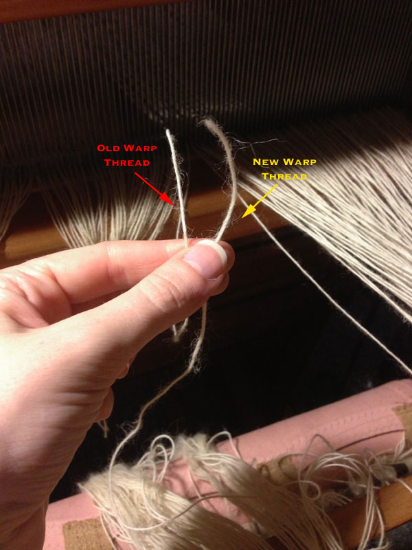 Here are the two threads I will be tying together! The new warp will be marked in yellow and the old warp marked in red.