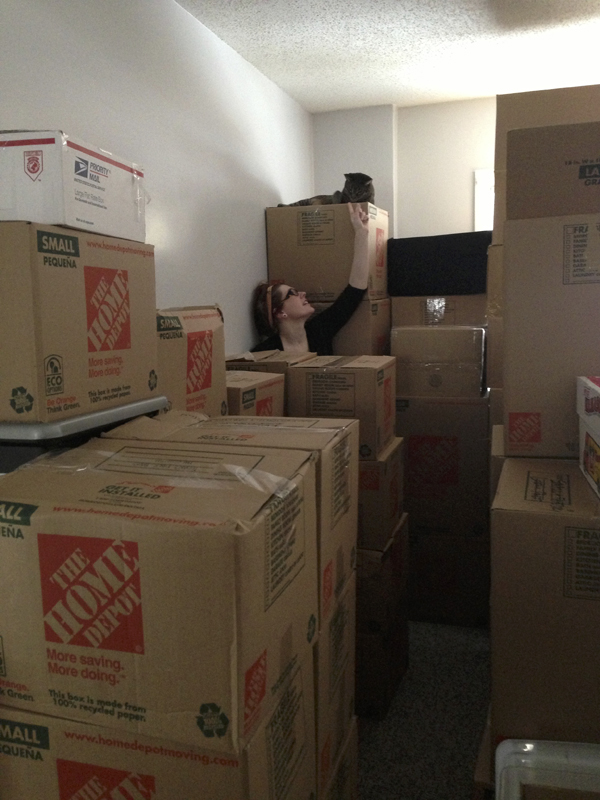 Rupert and I amongst the mountain of boxes in our last apartment.