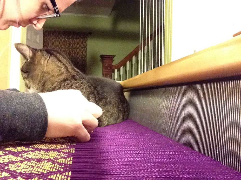 Working on a hemstitch with help from my big cat, Rupert (he always is involved with weaving projects)